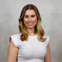 headshot of Maggie Harrison