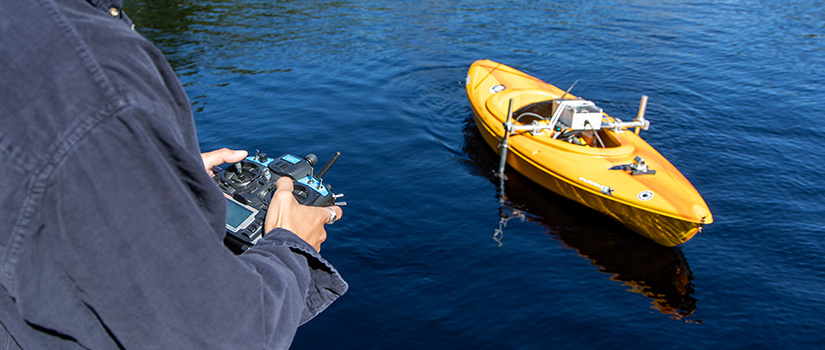 student trying out a device in water