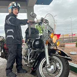 a woman with a motorcycle