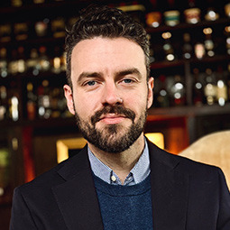 photo of man with dark shirt on