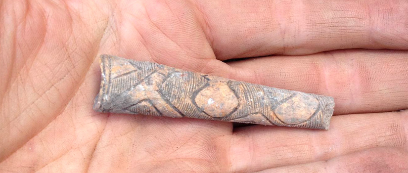 Recovered artifact in hand