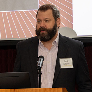 Jack Miller speaking at a podium