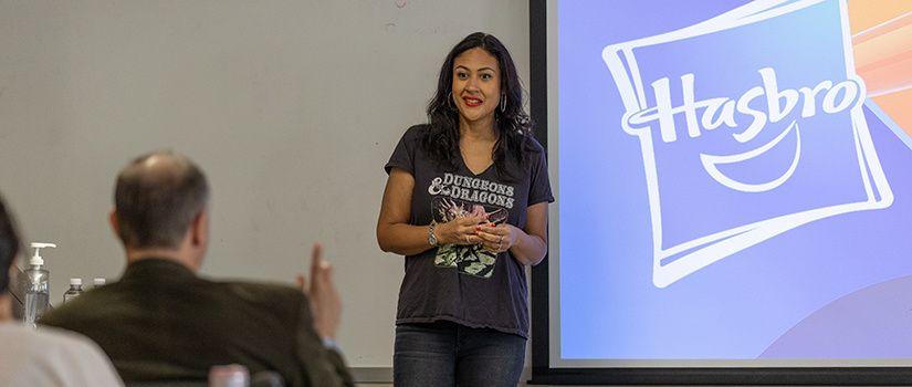 woman from Hasbro presenting to SJMC