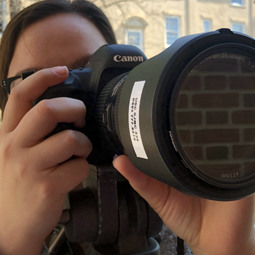 Girl holding camera