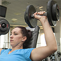 student lifting weights