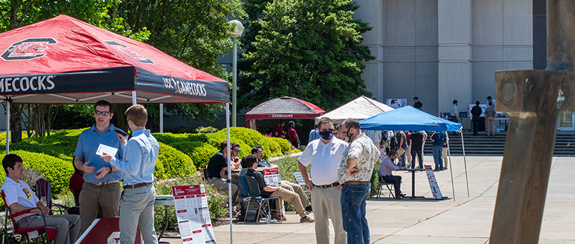 Capstone projects set up outside of the Swearingen Center