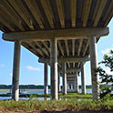 Image of the underside of an interstate bridge near water