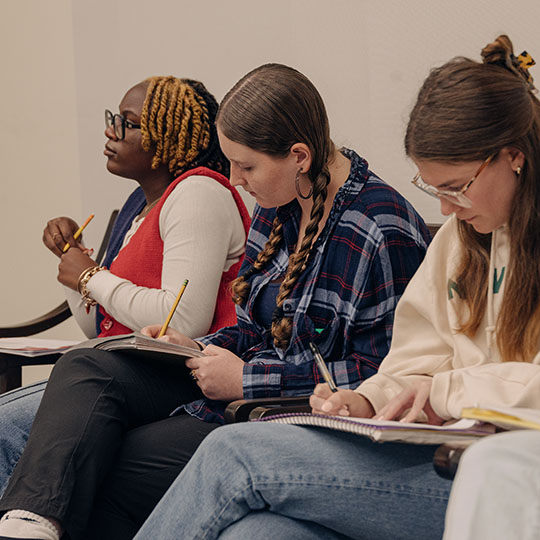 students taking notes during class