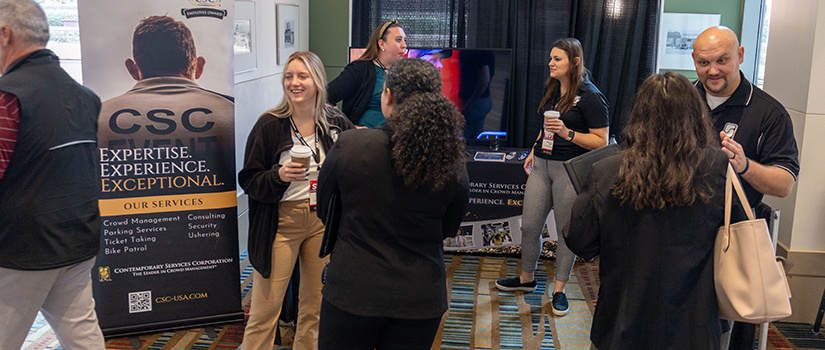 Employers and students at a career fair