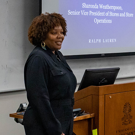 Sharonda Weatherspoon from Ralph Lauren speaks to retailing students.