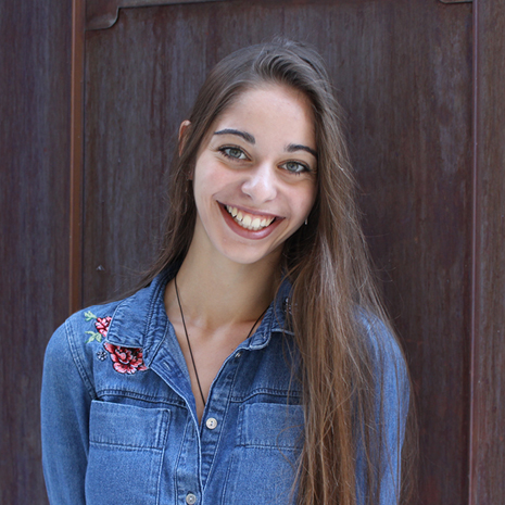 Photo of Alisa Berindea in the Moore School courtyard