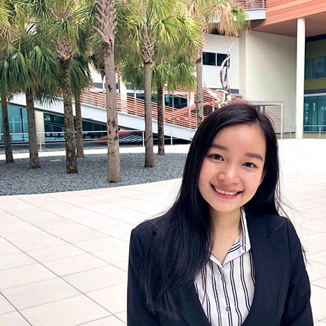 Image of Sunnie Duong in the Moore School courtyard