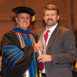 Dean with Award winner