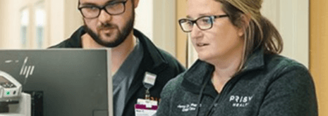 garnet bar with image of pharmacist in community pharmacy