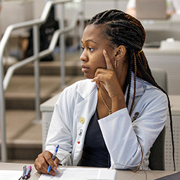 student at table