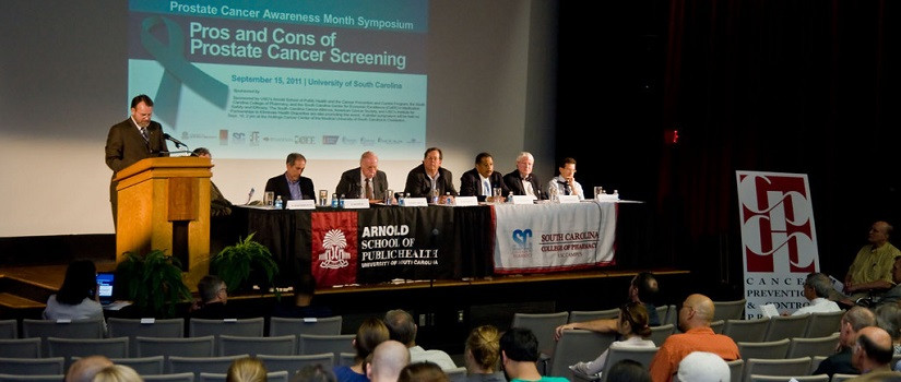 Dean of the Arnold School giving a speech at a podium