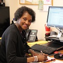 Ruby Drayton sitting in front of a computer