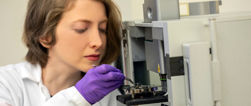 Woman working with research equipment