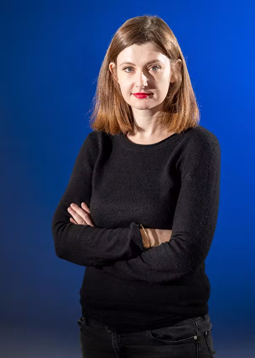 Portrait of white woman with brown shoulder-length hair