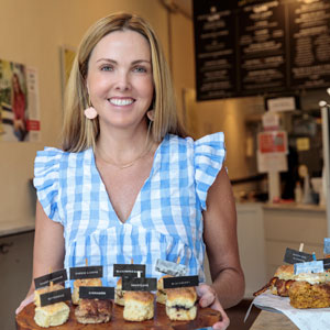 Carrie Morey holds a plate of biscuits