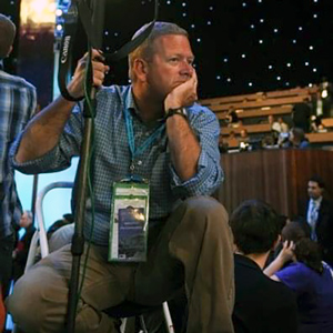 Win McNamee takes a break from photographing a political convention