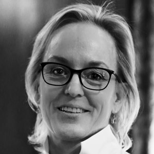 A headshot of Katy Close in black & white.