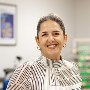 Photo of Golareh Jalilvand standing in lab
